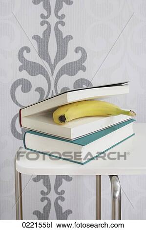 banana and books on table View Large Photo Image Stock Image - banana and books on table. Fotosearch