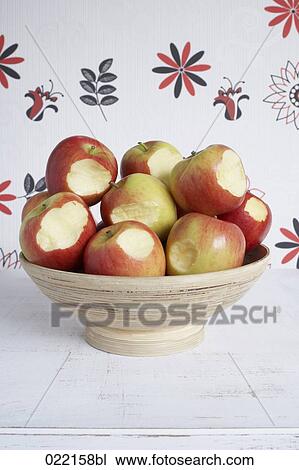 bowl full of bitten apples View Large Photo Image Stock Image - bowl full of bitten apples. Fotosearch