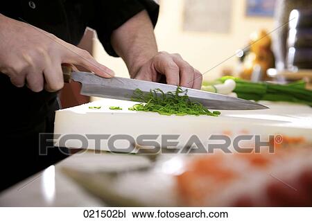 close-up of japanese chef cutting spring onions View Large Photo Image Stock Image - close-up of japanese chef cutting spring onions. Fotosearch