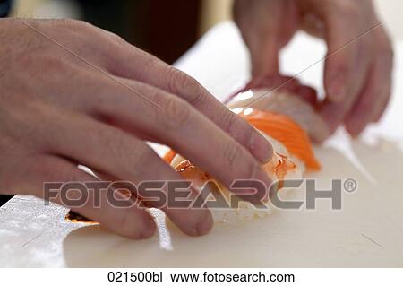 close-up of japanese chef making sushi View Large Photo Image Stock Image - close-up of japanese chef making sushi. Fotosearch