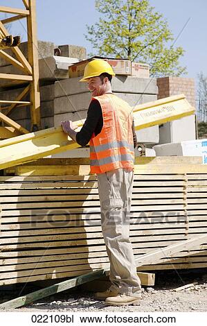construction worker with wooden plank View Large Photo Image Stock Image - construction worker with wooden plank. Fotosearch