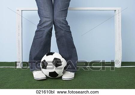 detail of woman with football View Large Photo Image Stock Image - detail of woman with football. Fotosearch