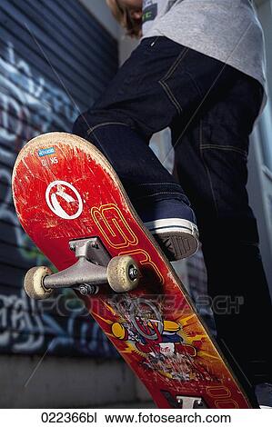 detail of young boy skateboarding View Large Photo Image Stock Image - detail of young boy skateboarding. Fotosearch