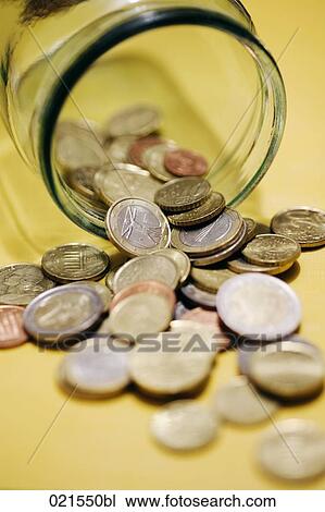 euro coins pouring out of glass jar View Large Photo Image Stock Image - euro coins pouring out of glass jar. Fotosearch