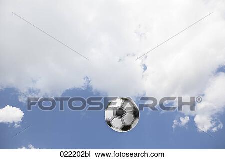 football flying through air View Large Photo Image Stock Image - football flying through air. Fotosearch