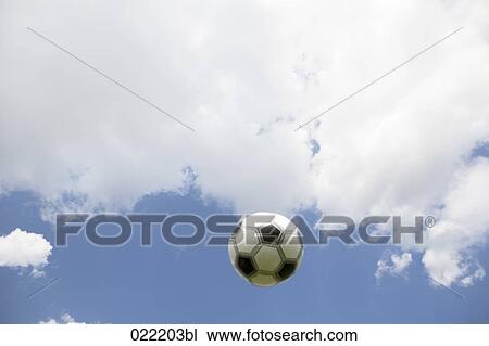 football flying through air View Large Photo Image Stock Image - football flying through air. Fotosearch