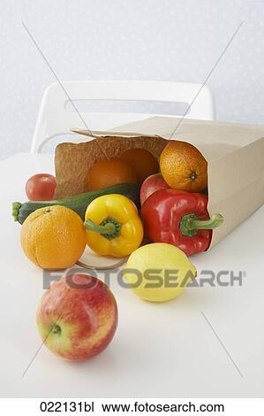 fruit and vegetables pouring out of paper bag View Large Photo Image Stock Image - fruit and vegetables pouring out of paper bag. Fotosearch