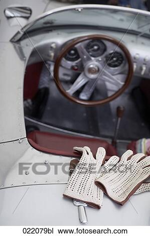 gloves lying on classic car View Large Photo Image Stock Image - gloves lying on classic car. Fotosearch
