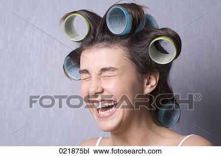 headshot of laughing teenage girl with curlers in her hair View Large Photo Image Stock Image - headshot of laughing teenage girl with curlers in her hair. Fotosearch