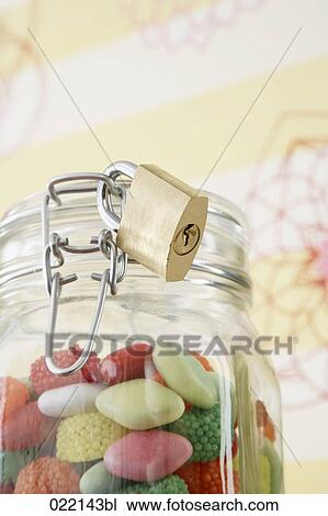 jar with candies protected by padlock View Large Photo Image Stock Image - jar with candies protected by padlock. Fotosearch