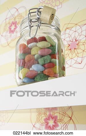 jar with candies protected by padlock View Large Photo Image Stock Image - jar with candies protected by padlock. Fotosearch