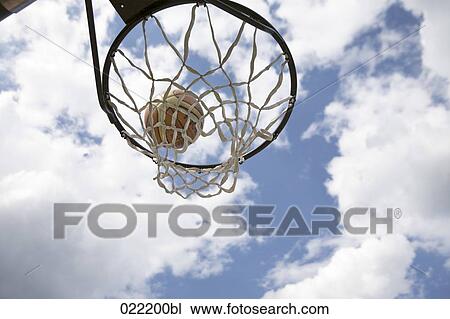 low angle view of basketball in basket View Large Photo Image Stock Image - low angle view of basketball in basket. Fotosearch
