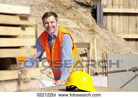 portrait of architect on construction site View Large Photo Image Stock Image - portrait of architect on construction site. Fotosearch