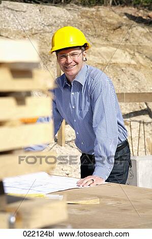 portrait of architect on construction site View Large Photo Image Stock Image - portrait of architect on construction site. Fotosearch
