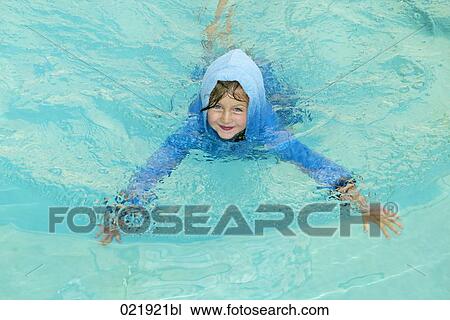 portrait of dressed girl swimming in pool View Large Photo Image Stock Image - portrait of dressed girl swimming in pool. Fotosearch