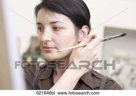 portrait of female artist at work View Large Photo Image Stock Image - portrait of female artist at work. Fotosearch