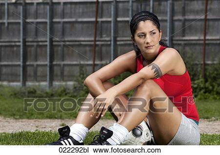 Stock Image - portrait of female football player. Fotosearch