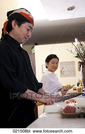 portrait of japanese chef preparing sushi View Large Photo Image Stock Image - portrait of japanese chef preparing sushi. Fotosearch