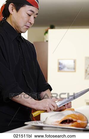 portrait of japanese chef preparing sushi View Large Photo Image Stock Image - portrait of japanese chef preparing sushi. Fotosearch