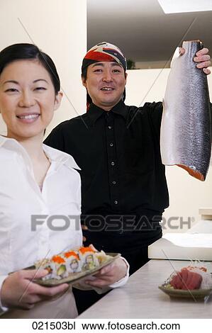 portrait of japanese waitress and chef with sushi View Large Photo Image Stock Image - portrait of japanese waitress and chef with sushi. Fotosearch