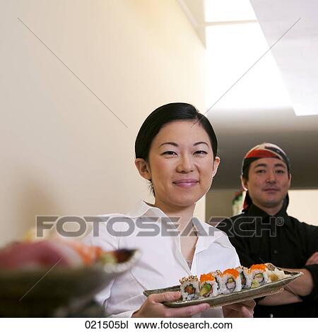 portrait of japanese waitress and chef with sushi View Large Photo Image Stock Image - portrait of japanese waitress and chef with sushi. Fotosearch