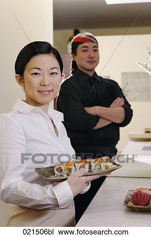 portrait of japanese waitress and chef with sushi View Large Photo Image Stock Image - portrait of japanese waitress and chef with sushi. Fotosearch