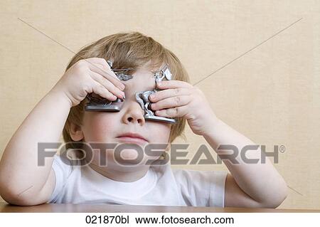 portrait of little boy playing with toy soldiers View Large Photo Image Stock Image - portrait of little boy playing with toy soldiers. Fotosearch