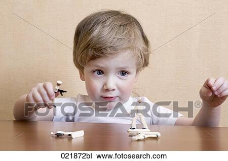 portrait of little boy playing with toy soldiers View Large Photo Image Stock Image - portrait of little boy playing with toy soldiers. Fotosearch