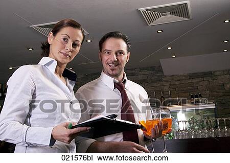 portrait of restaurant owner and waiter View Large Photo Image Stock Image - portrait of restaurant owner and waiter. Fotosearch