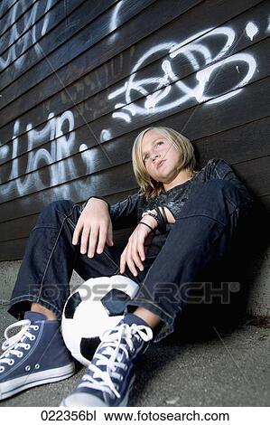 portrait of sulking blond boy with football View Large Photo Image Stock Image - portrait of sulking blond boy with football. Fotosearch