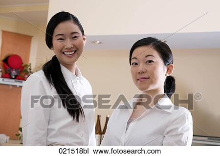 portrait of two japanese waitresses View Large Photo Image Stock Image - portrait of two japanese waitresses. Fotosearch