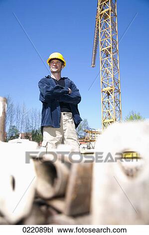 portrait of worker on construction site View Large Photo Image Stock Image - portrait of worker on construction site. Fotosearch