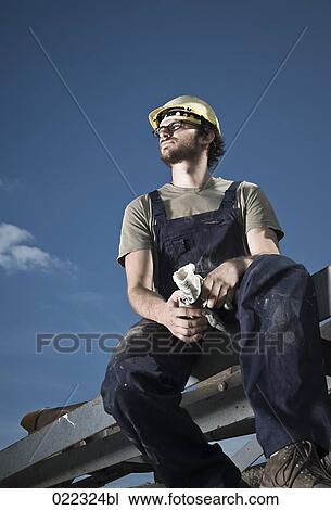 portrait of worker taking break View Large Photo Image Stock Image - portrait of worker taking break. Fotosearch