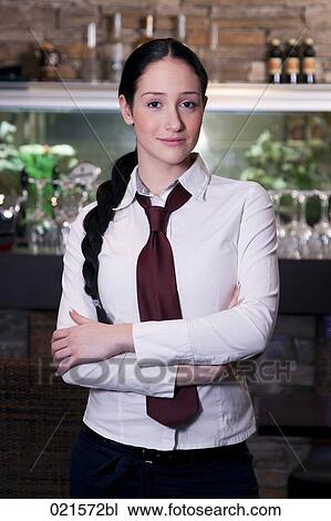 Stock Image - portrait of young waitress . Fotosearch