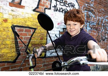 red haired boy on chopper bicycle View Large Photo Image Stock Image - red haired boy on chopper bicycle. Fotosearch