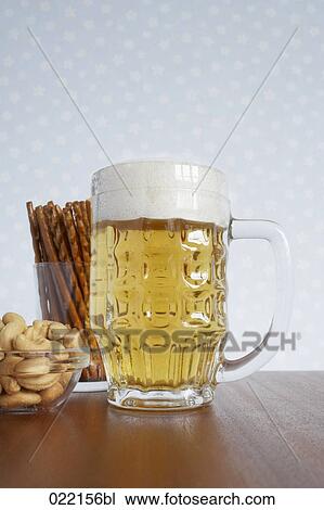 still life of beer peanuts and pretzel sticks View Large Photo Image Stock Image - still life of beer peanuts and pretzel sticks. Fotosearch