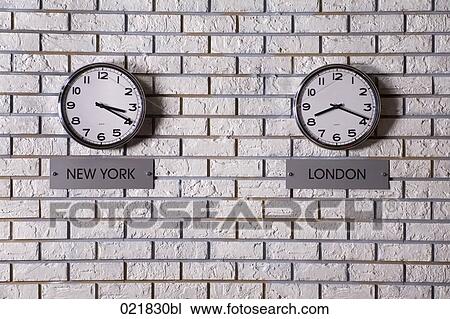 two wall clocks showing time in New York and London View Large Photo Image Stock Image - two wall clocks showing time in New York and London. Fotosearch