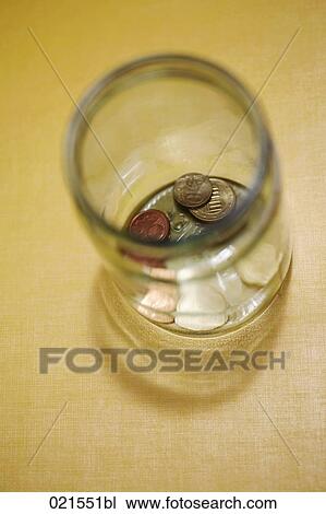 view into almost empty money jar View Large Photo Image Stock Image - view into almost empty money jar. Fotosearch