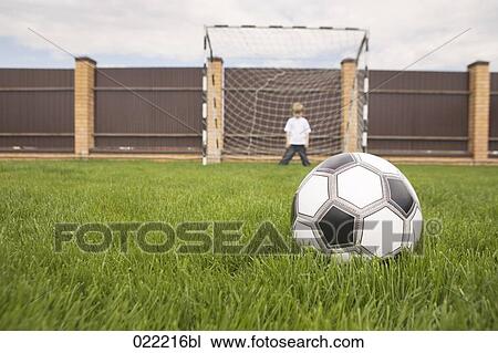 young boy in football goal waiting for the ball View Large Photo Image Stock Image - young boy in football goal waiting for the ball. Fotosearch