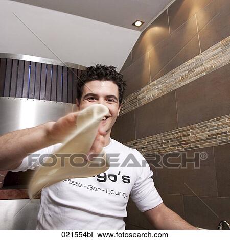 young pizza baker making dough View Large Photo Image Stock Image - young pizza baker making dough. Fotosearch