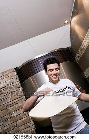 young pizza baker making dough View Large Photo Image Stock Image - young pizza baker making dough. Fotosearch