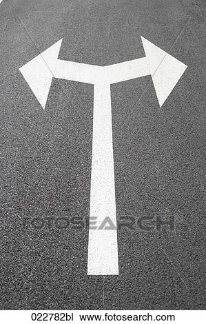 arrow sign on road leading in two directions View Large Photo Image Stock Image - arrow sign on road leading in two directions. Fotosearch