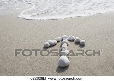 arrows made of stone showing direction to beach View Large Photo Image Stock Image - arrows made of stone showing direction to beach. Fotosearch