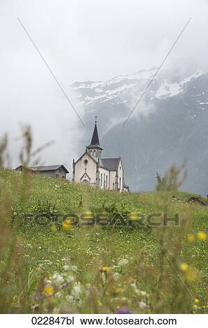 Stock Image - church in the mountains near Valorcine in France. Fotosearch