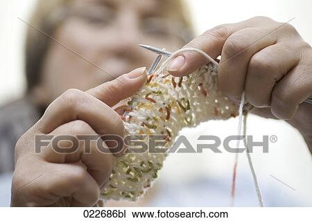 close-up of mature woman knitting View Large Photo Image Stock Image - close-up of mature woman knitting. Fotosearch