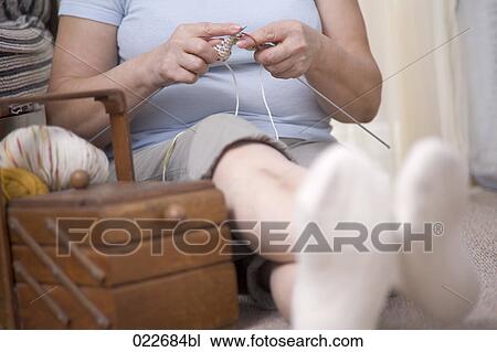 detail of mature woman knitting View Large Photo Image Stock Image - detail of mature woman knitting. Fotosearch