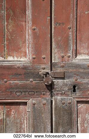 door of alpine hut closed with padlock View Large Photo Image Stock Image - door of alpine hut closed with padlock. Fotosearch