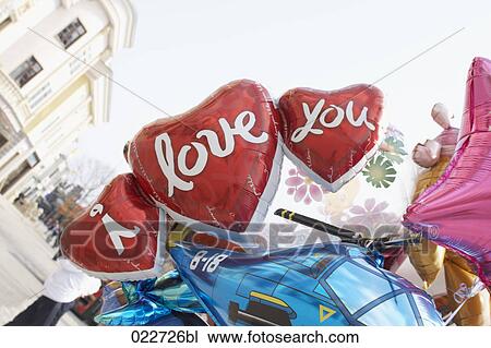 heart shaped red balloons forming the phrase i love you at the Prater in Vienna View Large Photo Image Stock Image - heart shaped red balloons forming the phrase i love you at the Prater in Vienna. Fotosearch
