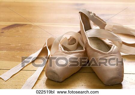 pair of ballet shoes on wooden floor View Large Photo Image Stock Image - pair of ballet shoes on wooden floor. Fotosearch