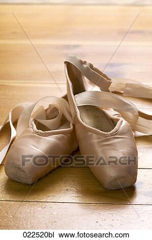 pair of ballet shoes on wooden floor View Large Photo Image Stock Image - pair of ballet shoes on wooden floor. Fotosearch